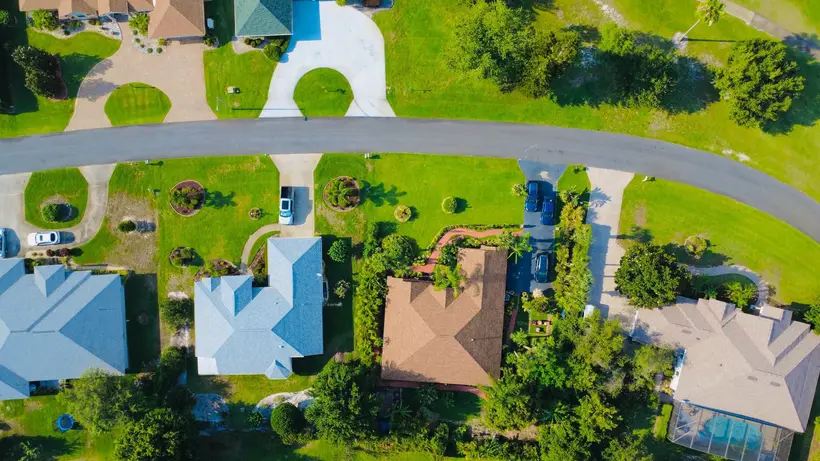 Aerial view of homes along a winding street
